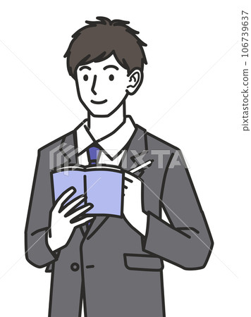 A man in a suit taking notes 106739637