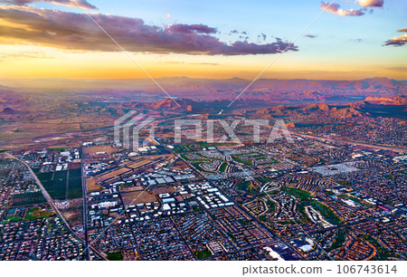 Aerial sunset landscape of suburbs of Phoenix, Arizona Aerial sunset landscape of suburbs of Phoenix, Arizona 106743614