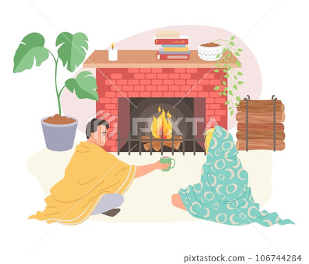 Couple wrapped in blanket sitting on home floor front of fireplace Couple wrapped in blanket sitting on home floor front of fireplace 106744284