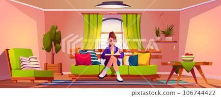 Young woman reading book in living room Young woman reading book in living room 106744422