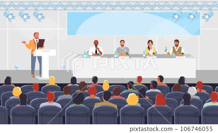 Man speaker performing front of audience on conference 106746055