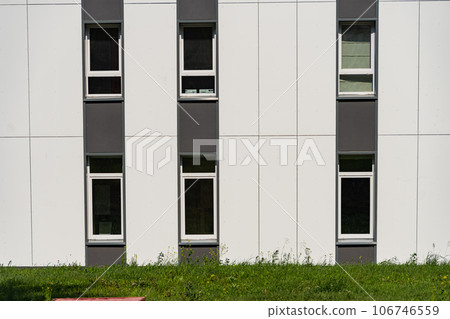 Facade of a modern residential building, building texture 106746559
