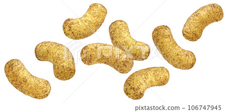 Falling corn sticks in chocolate powder isolated on white background 106747945