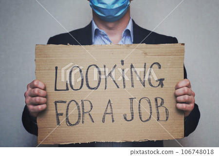 A young businessman who lost his job due to quarantine is looking for a job A young businessman who lost his job due to quarantine is looking for a job 106748018