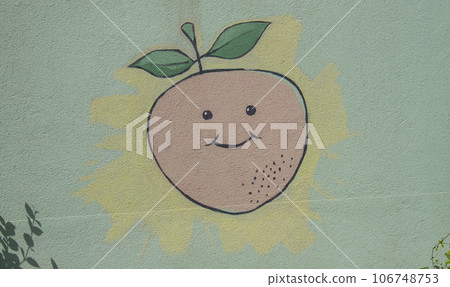 The painted wall in the building of the kindergarten. The color pictures drawn in the wall. education concept. The painted wall in the building of the kindergarten. The color pictures drawn in the wall. education concept. 106748753