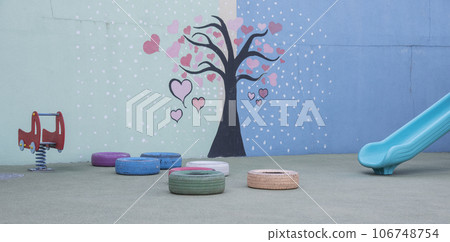 The painted wall in the building of the kindergarten. The color pictures drawn in the wall. education concept. 106748754