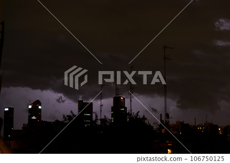 Ray. Storm. The sky is full of dark clouds in bad weather before a big storm rain. Light emission from the Edge of clouds. Zoom the surface of a Black haze at close range. Ray. Storm. The sky is full of dark clouds in bad weather before a big storm rain. Light emission from the Edge of clouds. Zoom the surface of a Black haze at close range. 106750125