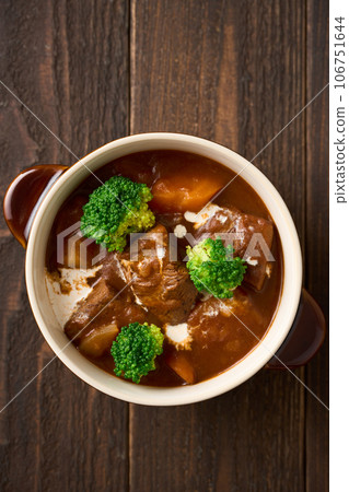 slow-cooked beef stew slow-cooked beef stew 106751644