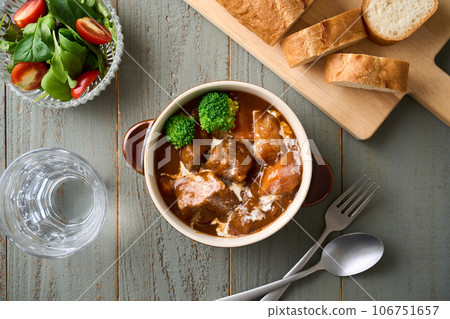 slow-cooked beef stew slow-cooked beef stew 106751657