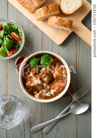 slow-cooked beef stew slow-cooked beef stew 106751658