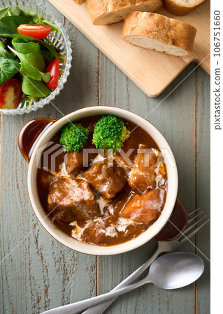 slow-cooked beef stew slow-cooked beef stew 106751660