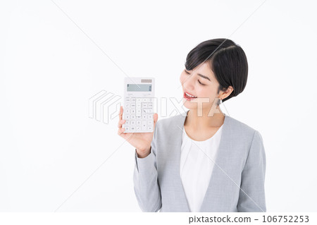 Calculator and business woman 106752253