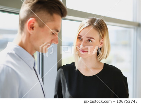 Beautiful woman portrait at workplace examining Beautiful woman portrait at workplace examining 106752745