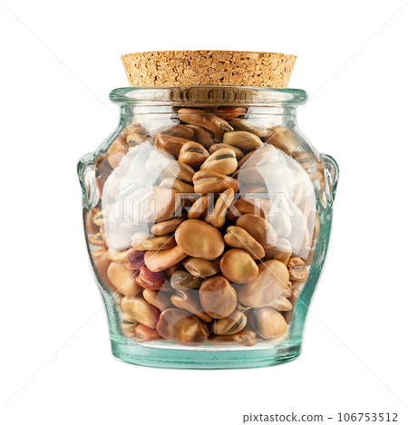 Dried Fava Beans, Broad Beans in Glass Jar isolated on white background. 106753512
