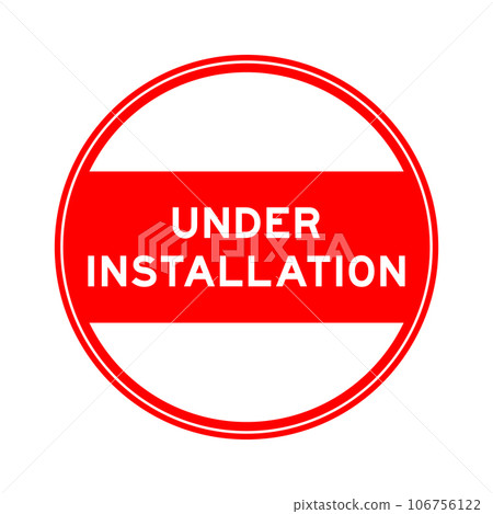 Red color round seal sticker in word under installation on white background 106756122