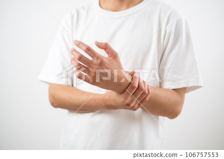 man with wrist pain man with wrist pain 106757553