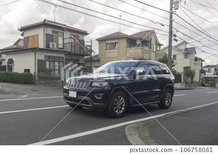 SUV utility vehicle road driving SUV utility vehicle road driving 106758081
