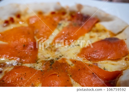 Close up of Smoked Salmon Pizza on the table. Close up of Smoked Salmon Pizza on the table. 106759592