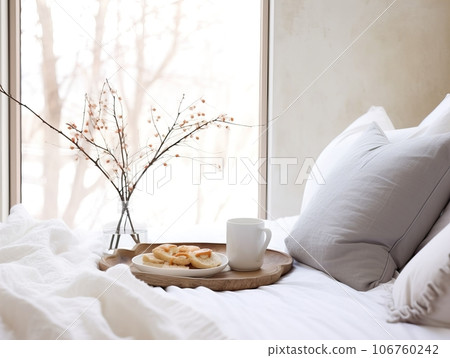 Beautiful cozy breakfast in bed, home bedroom interior with bright morning light, healthy food on decorated tray, weekend meal Beautiful cozy breakfast in bed, home bedroom interior with bright morning light, healthy food on decorated tray, weekend meal 106760242