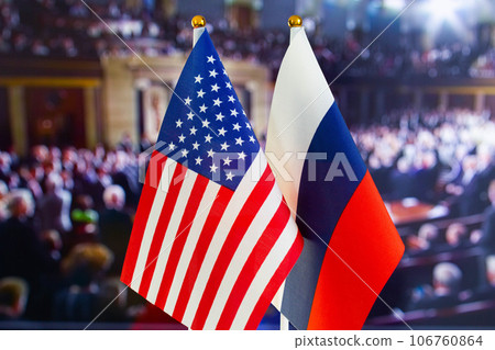 The US flag, Russian flag. Flag of USA, flag of Russia. The United States of America and the Russian Federation confrontation. Russia's invasion of Ukraine The US flag, Russian flag. Flag of USA, flag of Russia. The United States of America and the Russian Federation confrontation. Russia's invasion of Ukraine 106760864