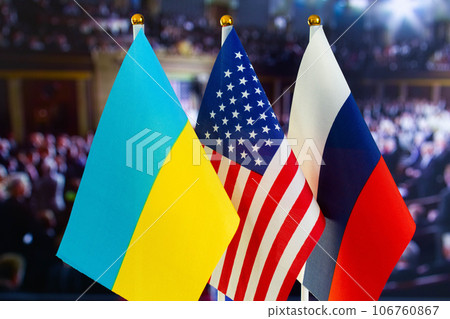 The US flag, Russian flag, Ukraine flag. Flag of USA, flag of Russia, flag of Ukraine. The United States of America and the Russian Federation confrontation. Russia's invasion of Ukraine 106760867