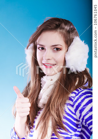 Young woman in wintertime. 106761845