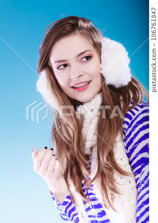 Young woman in wintertime. Young woman in wintertime. 106761847