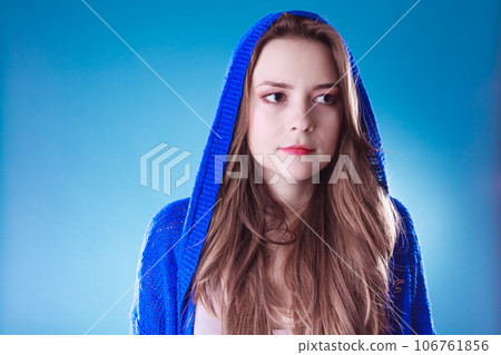 Young woman in sweater. 106761856