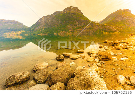 Mountains and fjord in Norway, 106762156
