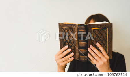 woman reading old books woman reading old books 106762714