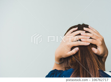 A woman holding a head A woman holding a head 106762717