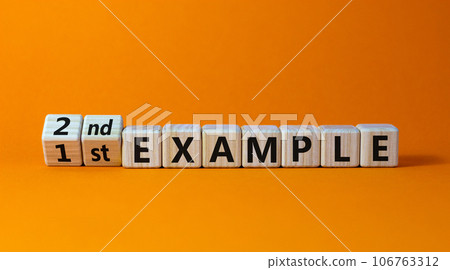 Turned a cubes and changed the expression '1 st example' to '2nd example'. Beautiful orange background. Business concept. Copy space. Turned a cubes and changed the expression '1 st example' to '2nd example'. Beautiful orange background. Business concept. Copy space. 106763312