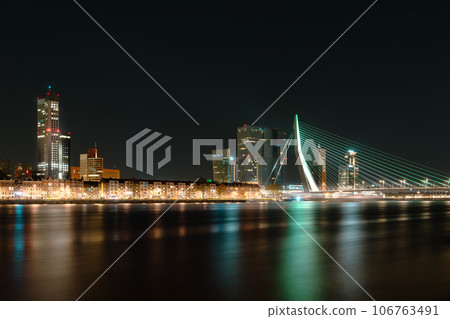 Timeless Beauty of Rotterdam's Nightfall, Where Skyscrapers Sparkle Amidst Reflections on the Water Timeless Beauty of Rotterdam's Nightfall, Where Skyscrapers Sparkle Amidst Reflections on the Water 106763491