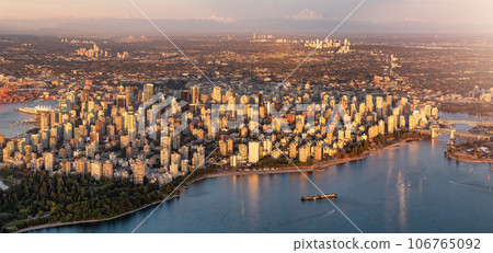 Aerial View of Stanley Park and Downtown Vancouver City on Ocean Coast. Sunset 106765092
