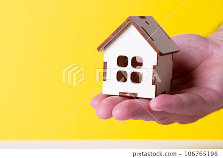 Buying a house. The buyer receives the key to the property. 106765198