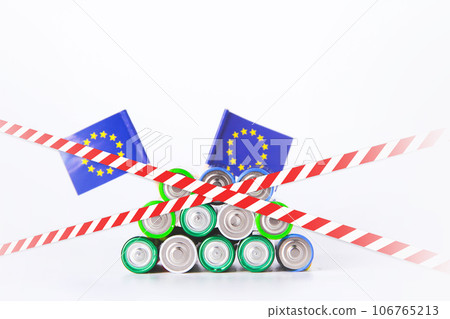 Battery. A lot of batteries on the background of the flag of the country. 106765213