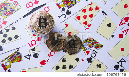 Casino and bitcoin. Chips in the form of bitcoins on the poker table. 106765456