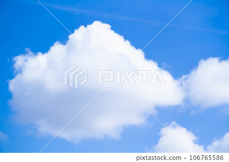 Cumulus clouds. White clouds on a blue background. 106765586