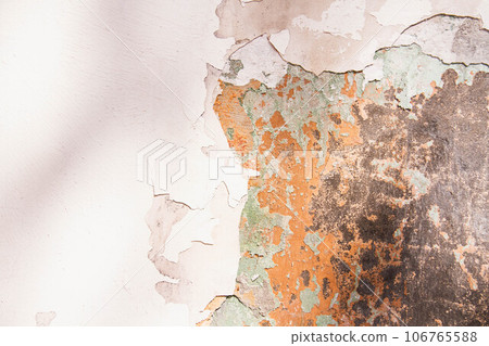 Cracked paint texture. Grunge wall texture. Dark wall with old paint Cracked paint texture. Grunge wall texture. Dark wall with old paint 106765588