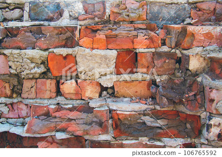 Texture of an old stone with a crack. Grunge brick texture. Texture of an old stone with a crack. Grunge brick texture. 106765592