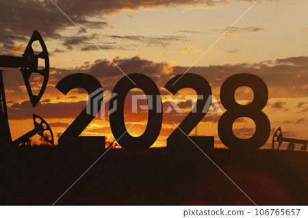Oil production against backdrop of beautiful sunset. 2028 and oil fields. Purchase and sale of crude oil for dollar. 106765657