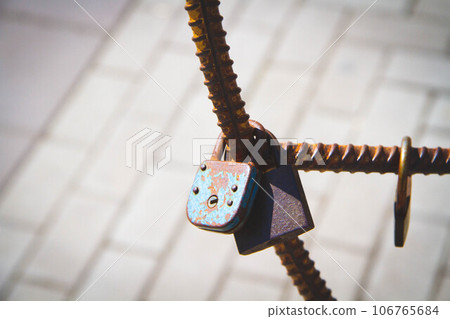 Old padlock. Door lock in the form of a heart. 106765684