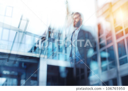 Thoughtful hipster businessman in the office. Double exposure effects Thoughtful hipster businessman in the office. Double exposure effects 106765950