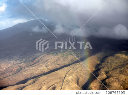 Rainbow hangs over Maui modern windmills Rainbow hangs over Maui modern windmills 106767305