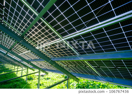 Solar panel with nano coating. Renewable energy from the sun, green energy, concept Generate energy. View of the panels from the other side. Metal constructions. 106767436