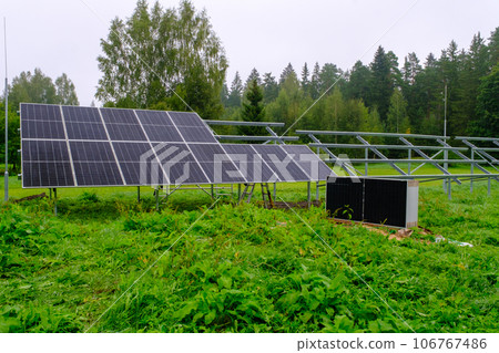 Solar panel with nano coating. Renewable energy from the sun, green energy, concept Generate energy. Side view of the panels during construction. Metal constructions Solar panel with nano coating. Renewable energy from the sun, green energy, concept Generate energy. Side view of the panels during construction. Metal constructions 106767486