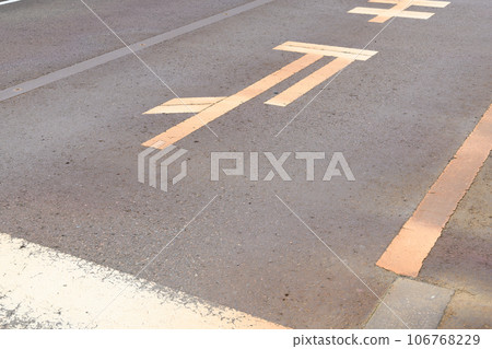 Road dirty with rust caused by snow removal pipes 106768229