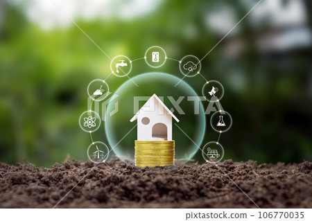 House model on land with clean energy icon. Eco-friendly house concept and energy-saving and eco-friendly house. House model on land with clean energy icon. Eco-friendly house concept and energy-saving and eco-friendly house. 106770035