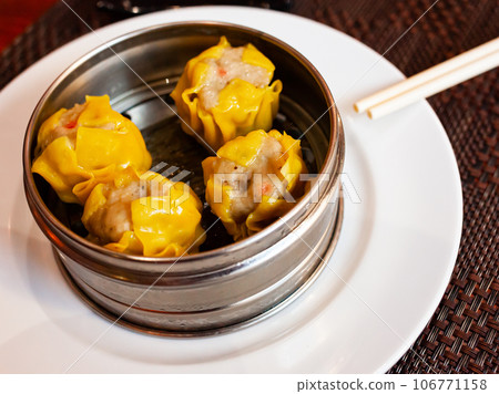 Chinese dish - dumplings shumai with soy sauce 106771158