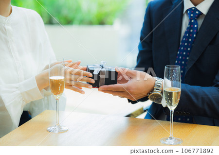 Couple toast restaurant proposal Couple toast restaurant proposal 106771892